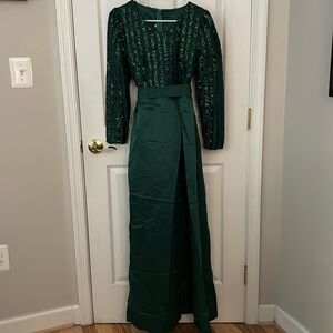 Never Worn. Emerald green. formal gown. Floor length. Size medium.